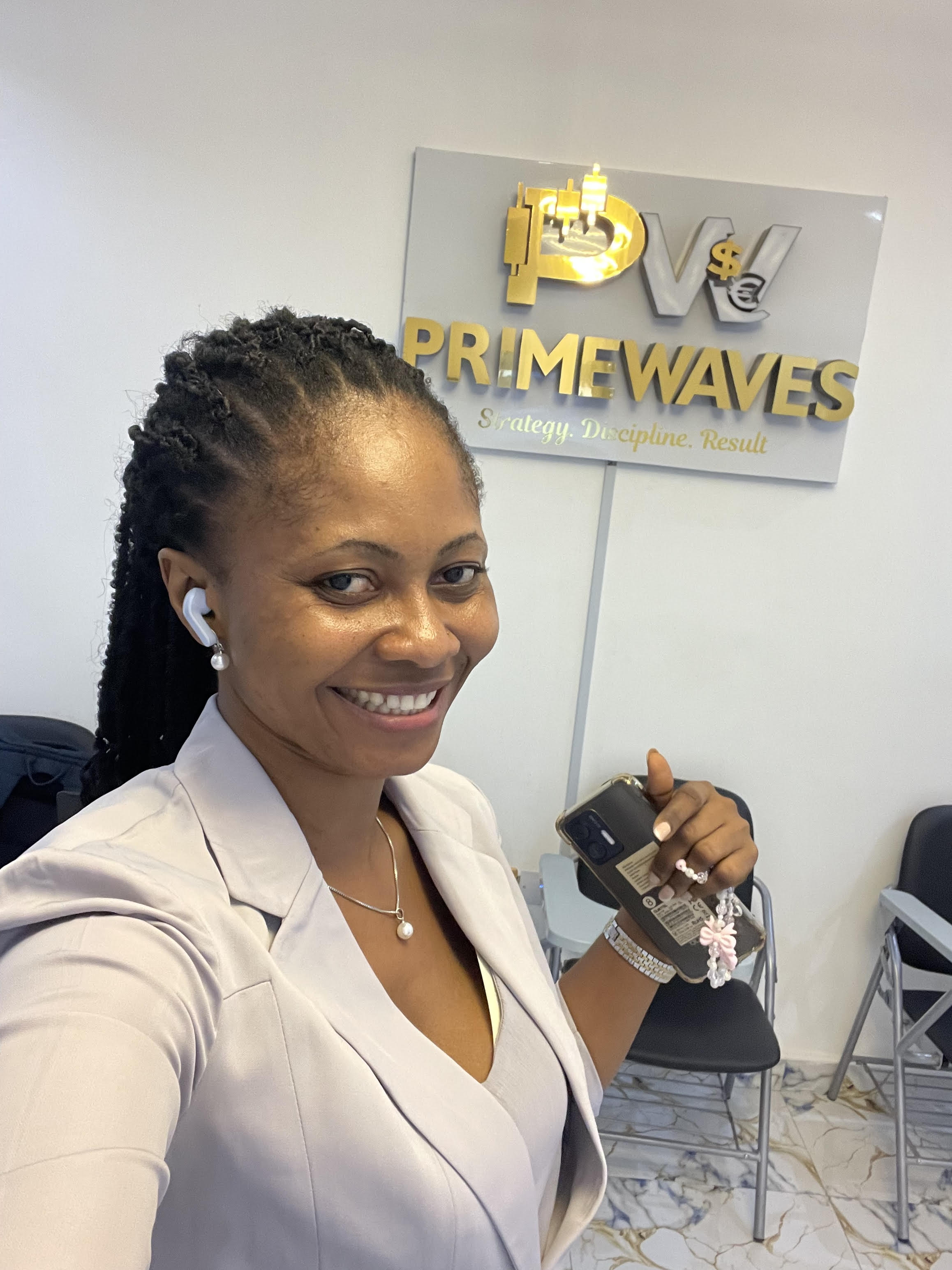 Firima Regina - Secretary of Primewaves Markets Ltd, expert in financial markets, organization and operational excellence